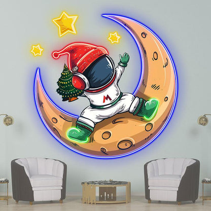 Christmas miracle on the moon: astronauts in Santa hats, holding Christmas trees neon signs