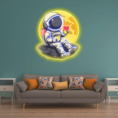 Love in Space: Astronaut Sipping Heart-Shaped Drink Neon Light - Charming LED Decor for Romantic Space Enthusiasts